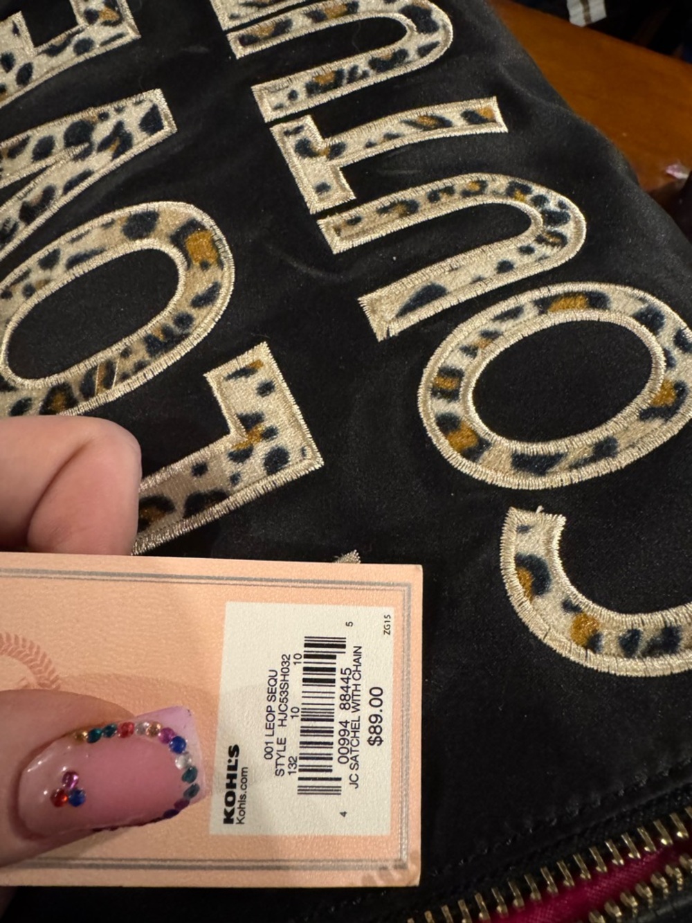 Juicy Couture leopard print duffel with pink inside